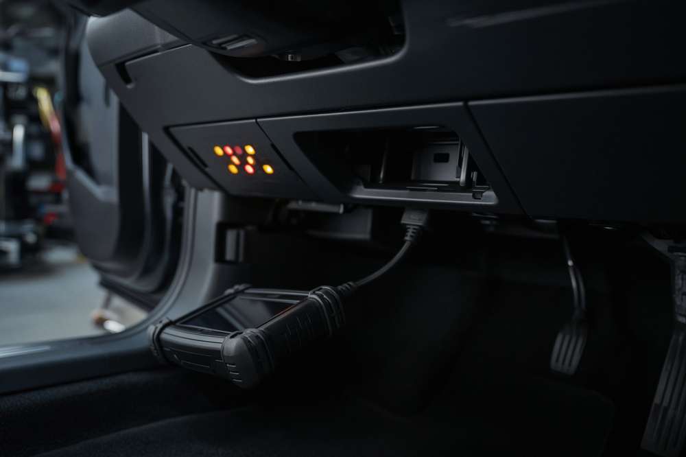 Diagnostic scan tool connected to a vehicle